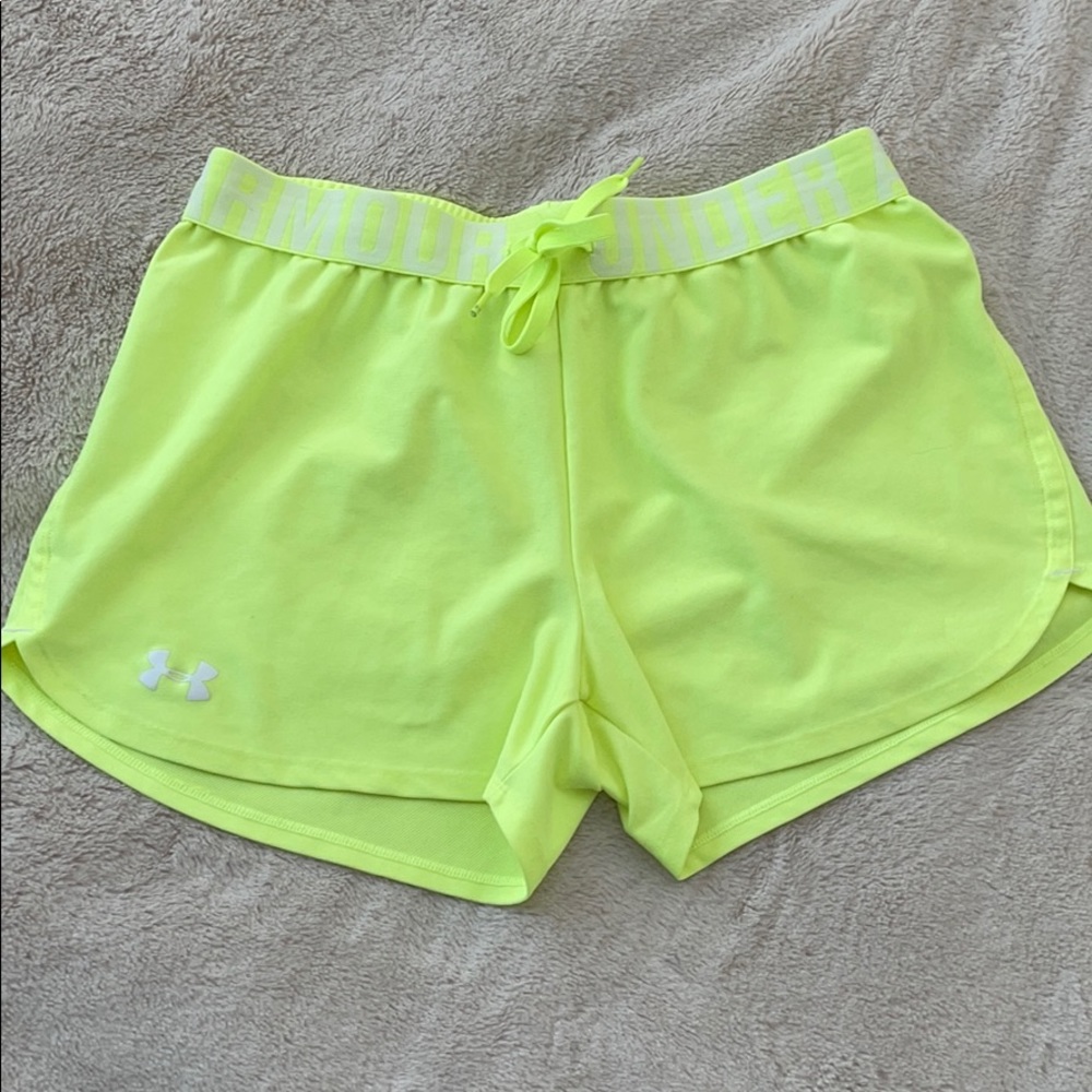 Bright yellow Under Amour shorts